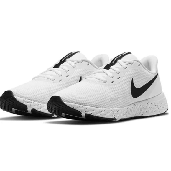 Nike Shoes - Nike Revolution Women’s White and Black Running Shoes size 9.5